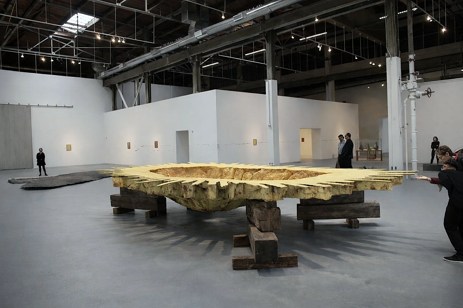 MOCA installation view of large, pale-yellow cast sculpture in room designed by Sparano + Mooney Architecture