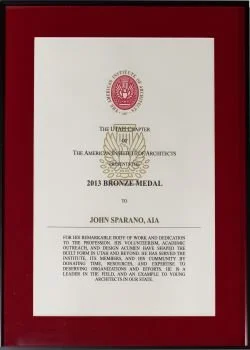 Certificate awarded to John Sparano, AIA, for a 2013 Bronze Medal from the American Institute of Architects, signed by the institute's president and leadership.