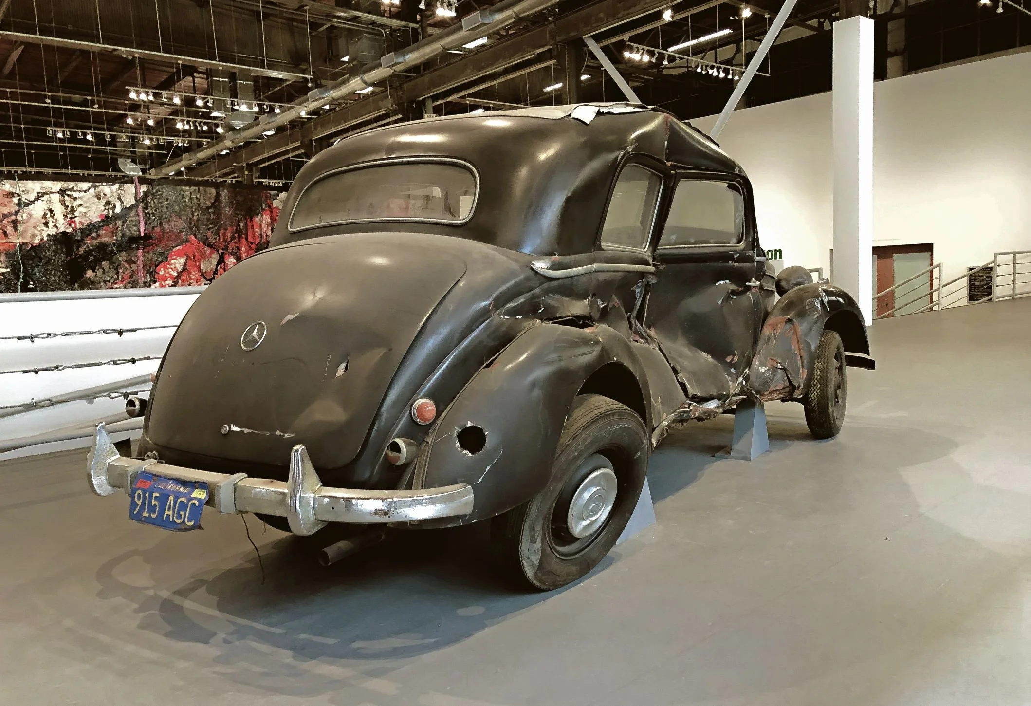 MoCA installation view of vintage black Mercedes sculpture designed by Sparano + Mooney Architecture