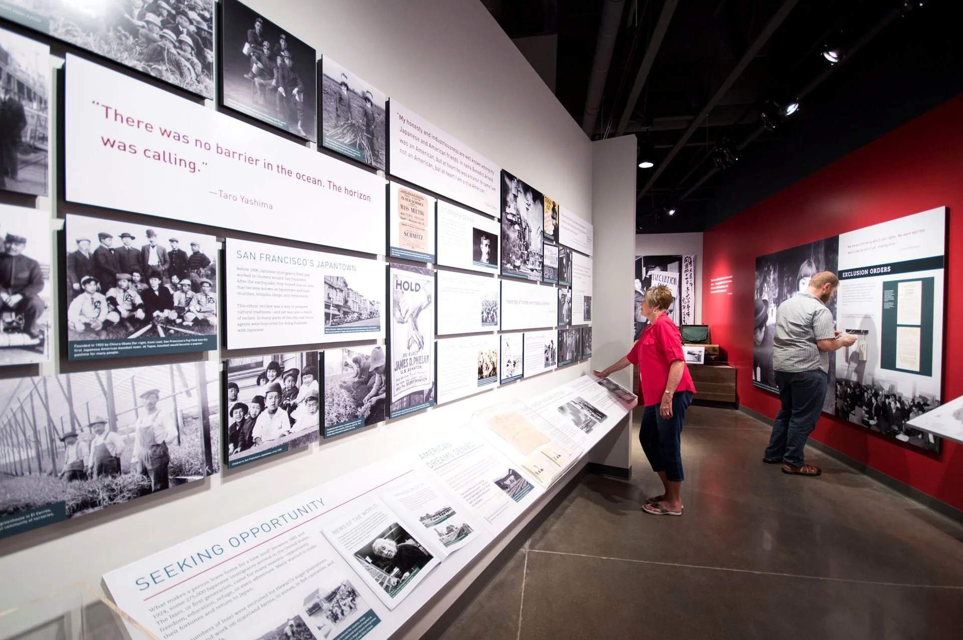 Visitors learning about Japanese American history in Topaz Museum designed by Sparano + Mooney Architecture