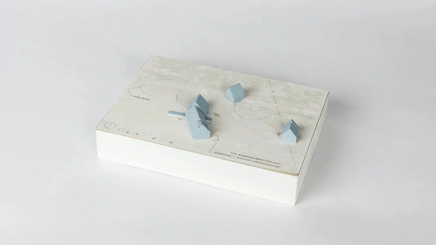 Glashausen architectural scale model with multiple gabled masses across a site designed by Sparano + Mooney Architecture