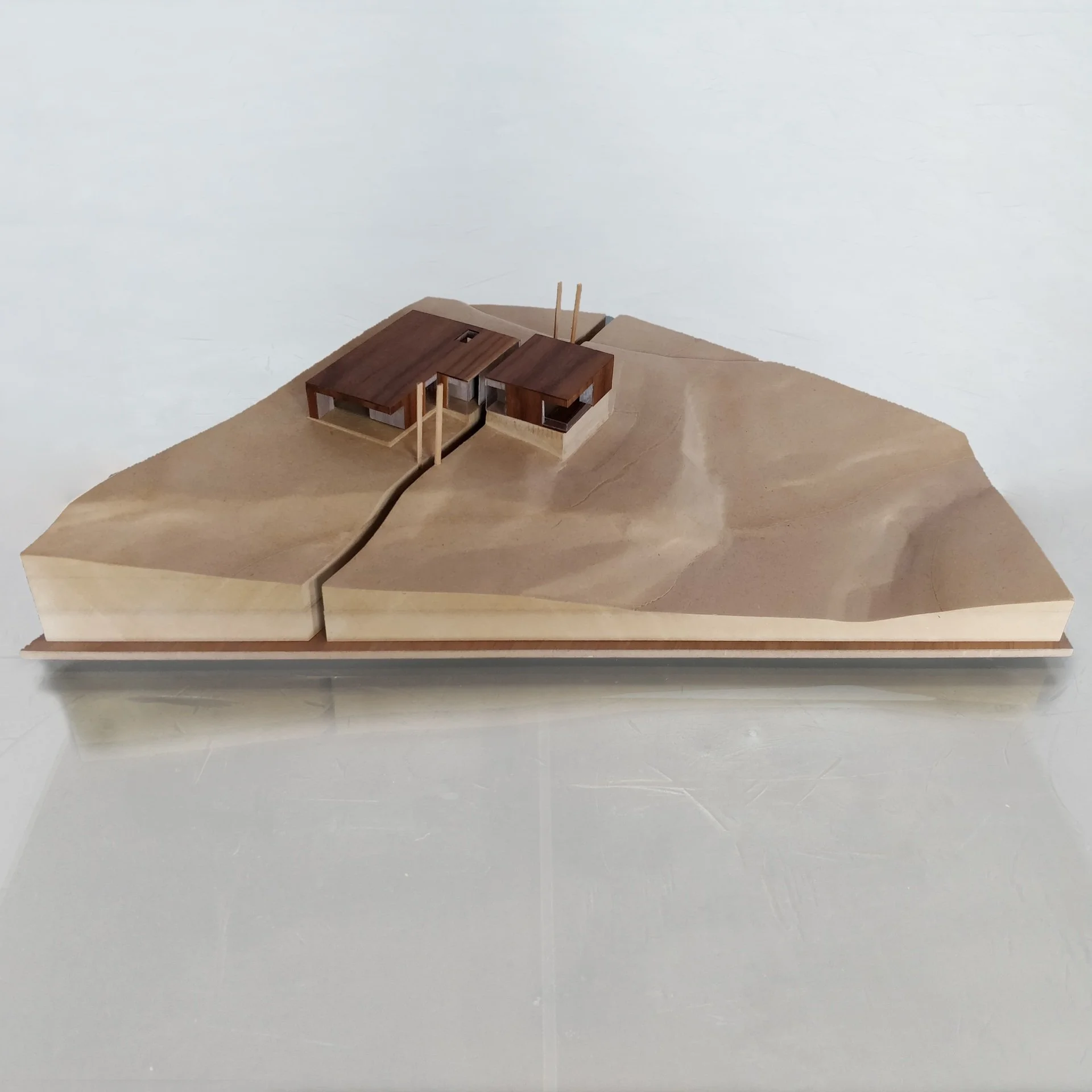 Emigration Creek Residence physical site architectural model with a section slice through the middle, designed by Sparano + Mooney Architecture