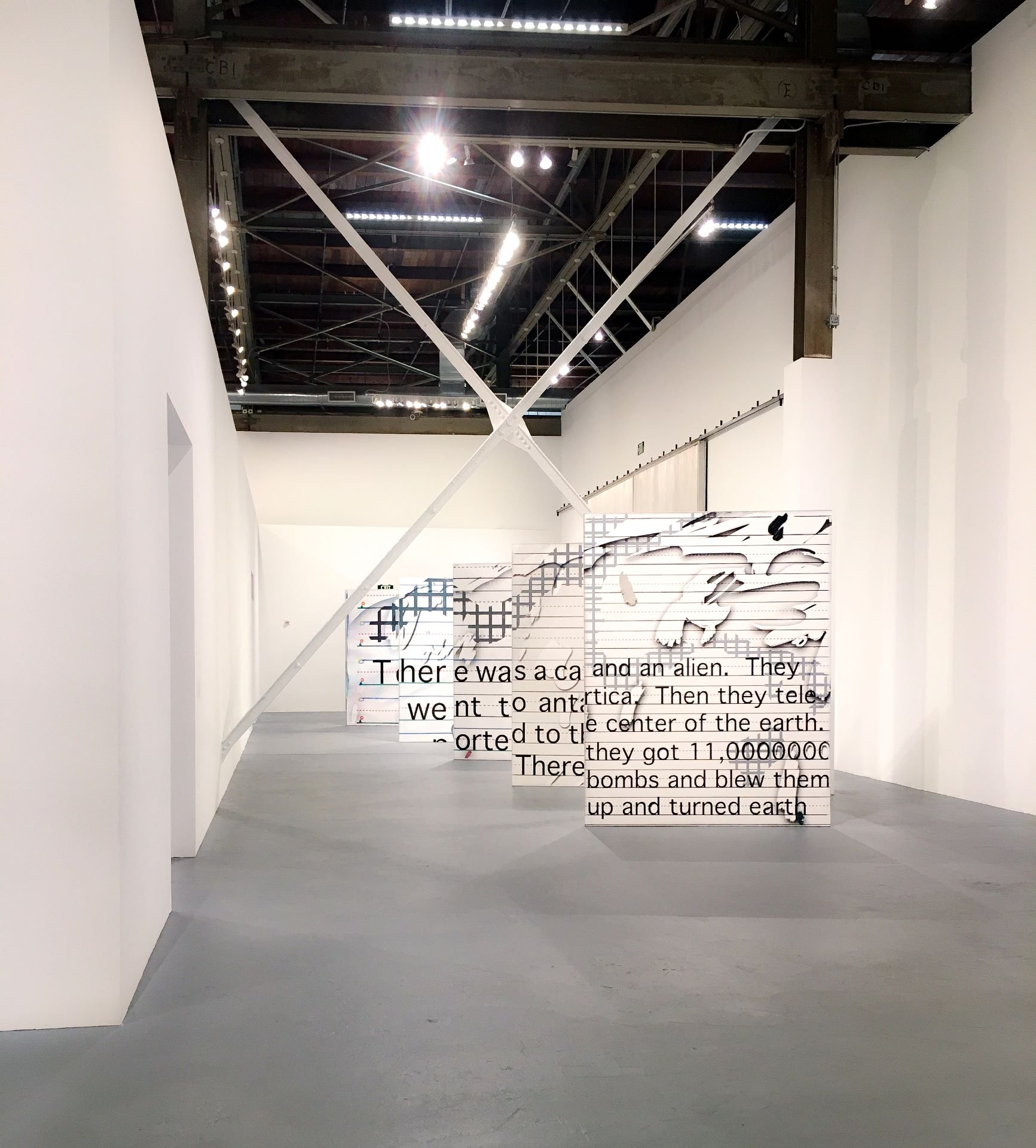Owens MoCA installation of large sculptural panels with black and white text designed by Sparano + Mooney Architecture