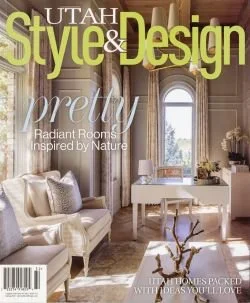 Magazine cover of Utah Style & Design featuring a luxurious and airy living room with large arched window, beige sofas, and elegant decor. Text highlights include 'pretty,' 'Radiant Rooms inspired by Nature,' and 'Harmonies Packed with Ideas You Love.'