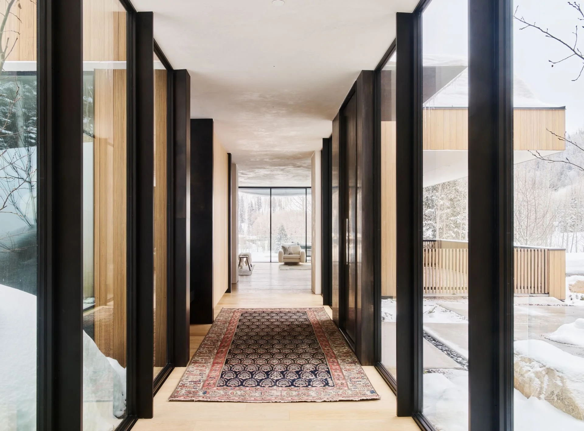 Park City Nest Residence interior hall with panoramic side windows designed by Sparano + Mooney Architecture