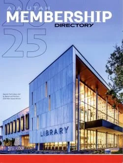Cover of a membership directory featuring a modern library building with large glass windows and a prominent library sign, under a clear sky.