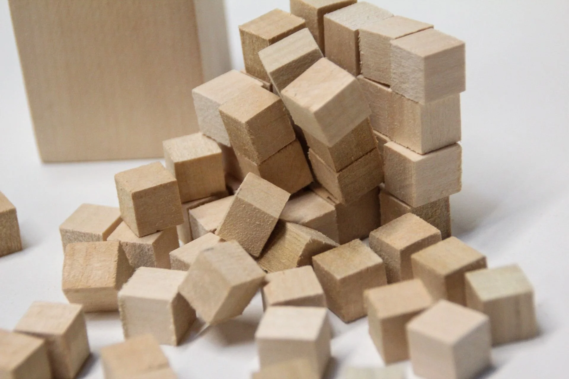 Interlaken study model of small wooden cubes in a pile, designed by Sparano + Mooney Architecture