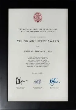 Certificate of the Young Architect Award presented to Anne G. Mooney by The American Institute of Architects Western Mountain Region, dated October 10, 2014, with signatures at the bottom.