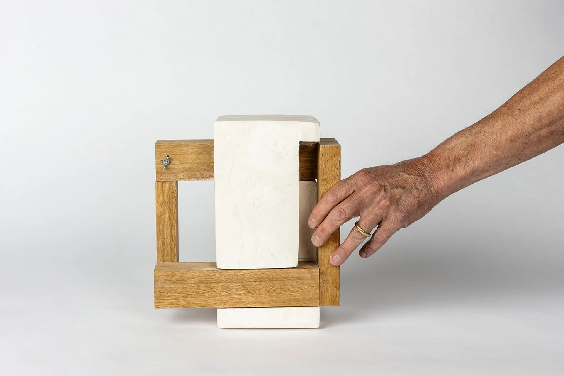 Wabi-Sabi wood and plaster heuristic device being pushed into place designed by Sparano + Mooney Architecture