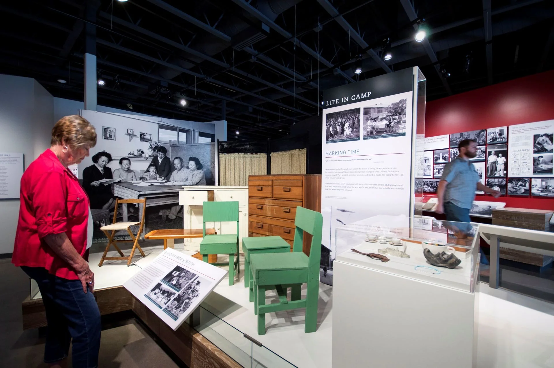 Topaz Museum people in exhibition space designed by Sparano + Mooney Architecture