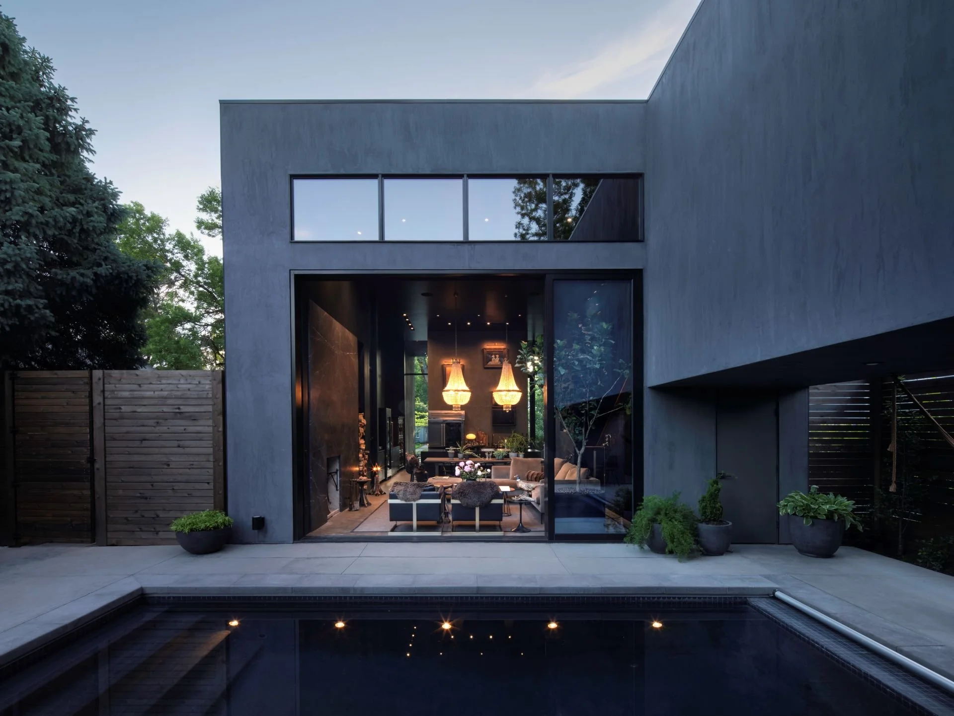 Urban Treehouse residence view from courtyard into open living room designed by Sparano + Mooney Architecture