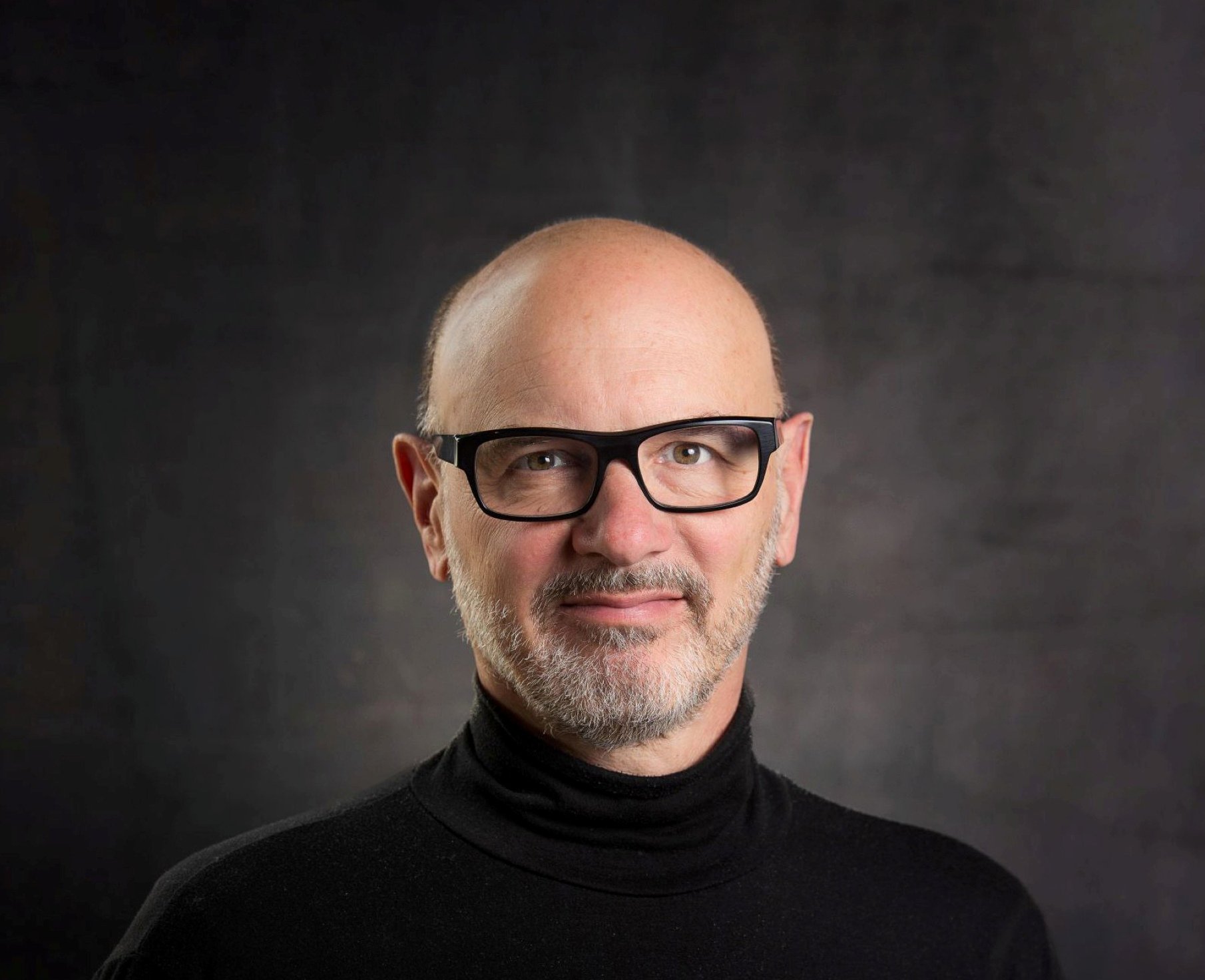 Headshot of John Sparano, principal architect and founding partner of Sparano + Mooney Architecture