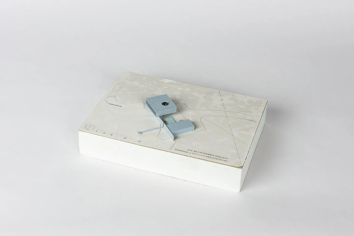 Glashausen architectural scale model of two rectangular building masses separated by an exterior pool and courtyard designed by Sparano + Mooney Architecture