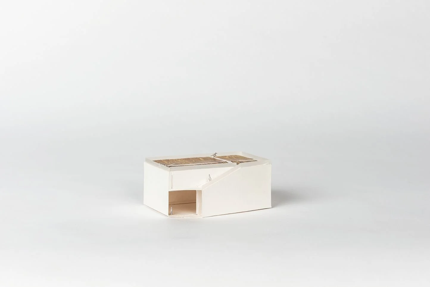 NEHMA study model, white massing with large facade opening and occupiable roof designed by Sparano + Mooney Architecture