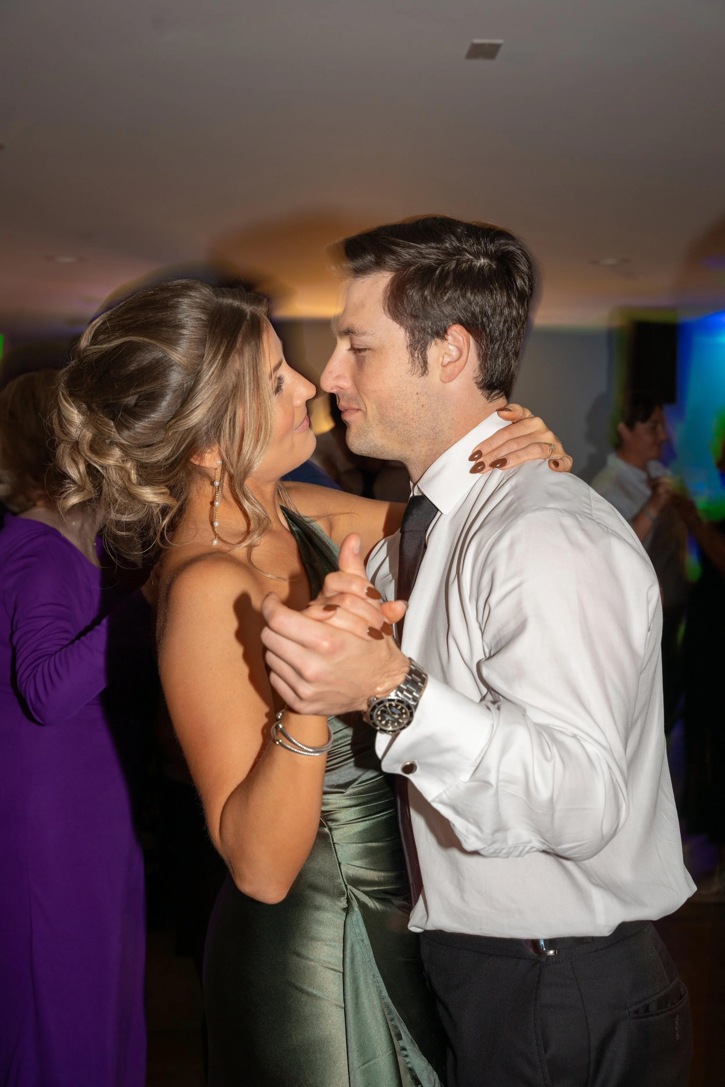 A couple dancing closely during a wedding at Red Jacket Resort in Cape Cod. 