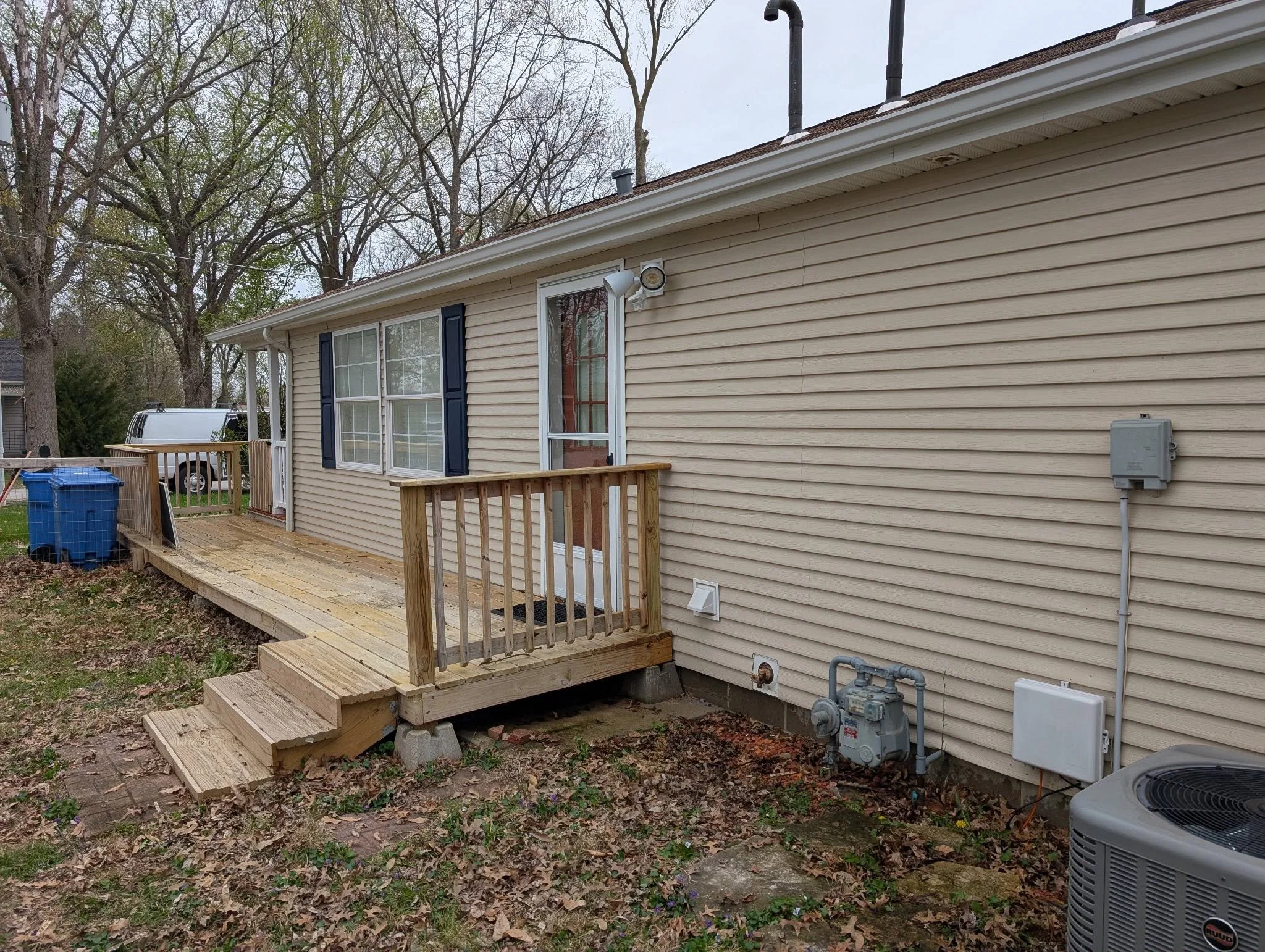 Siding, soffit and gutter faces washed down the side of the house