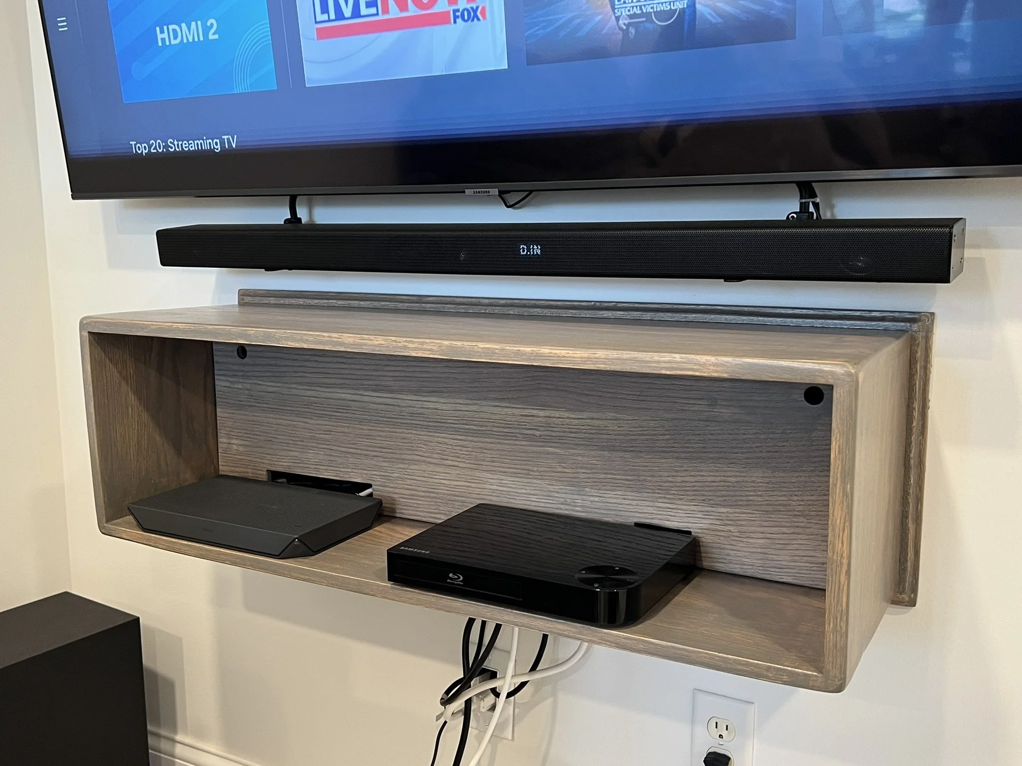 Custom floating tv entertainment center console made of red oak