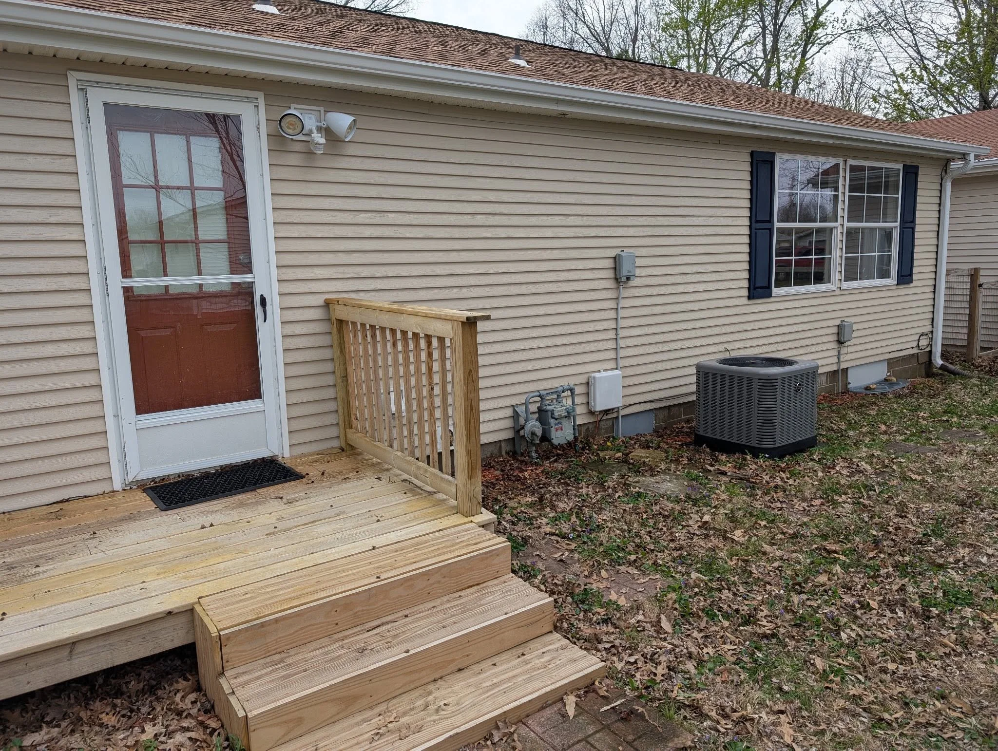 Back door, deck and siding after washing