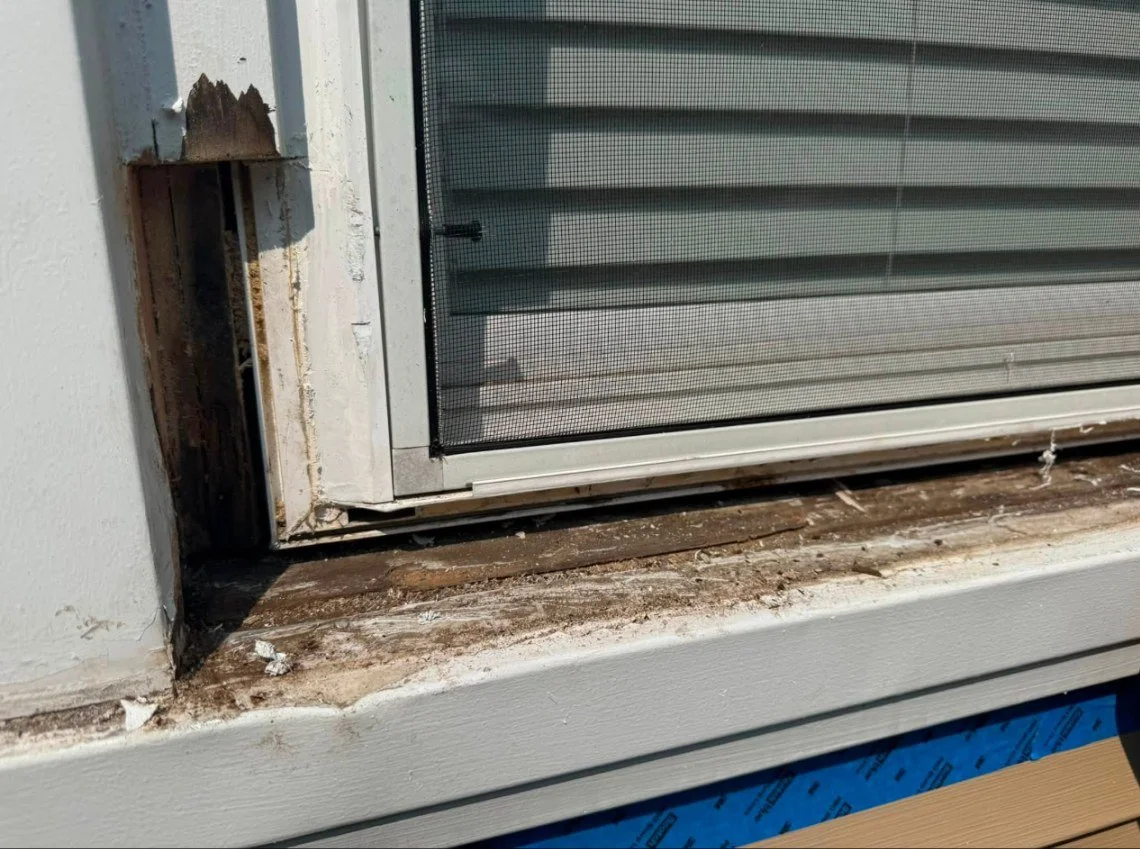 Rotted window sill — before