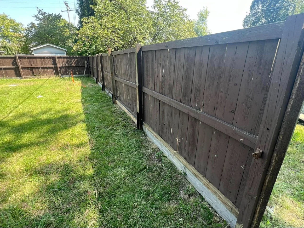 Privacy fence — posts reset and new bottom rails