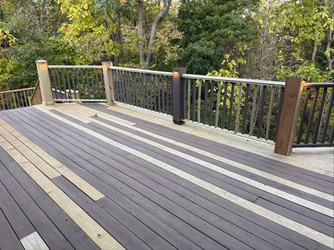 Deck board replacement and railing repair