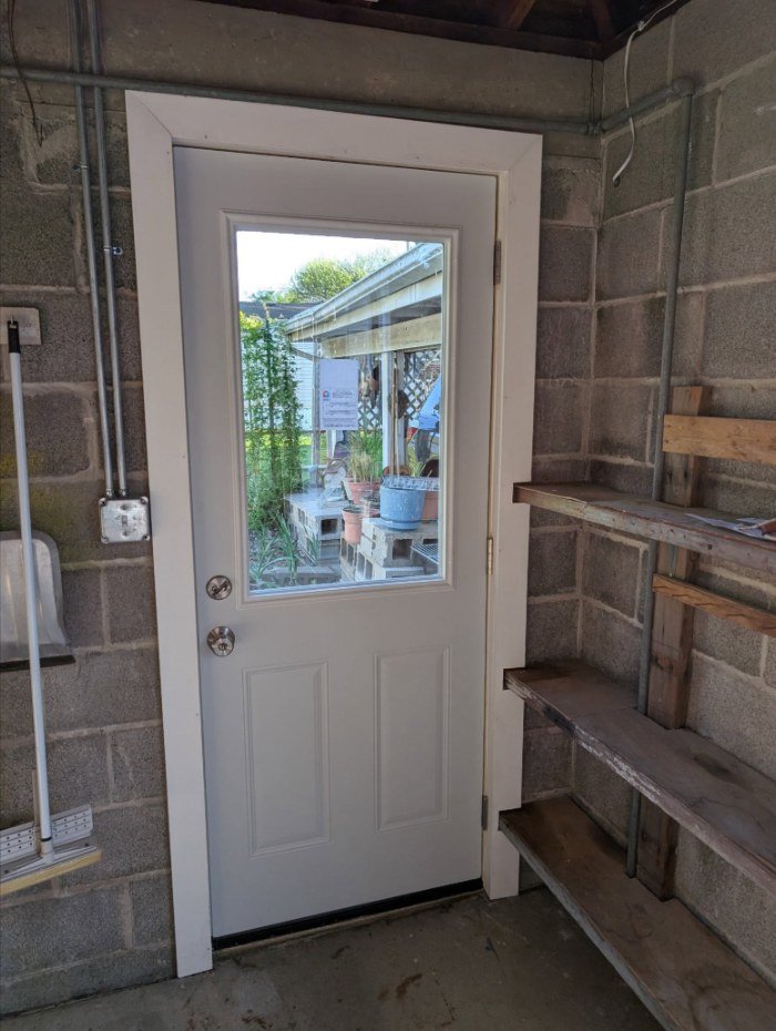 Door cased out on the inside of a block wall