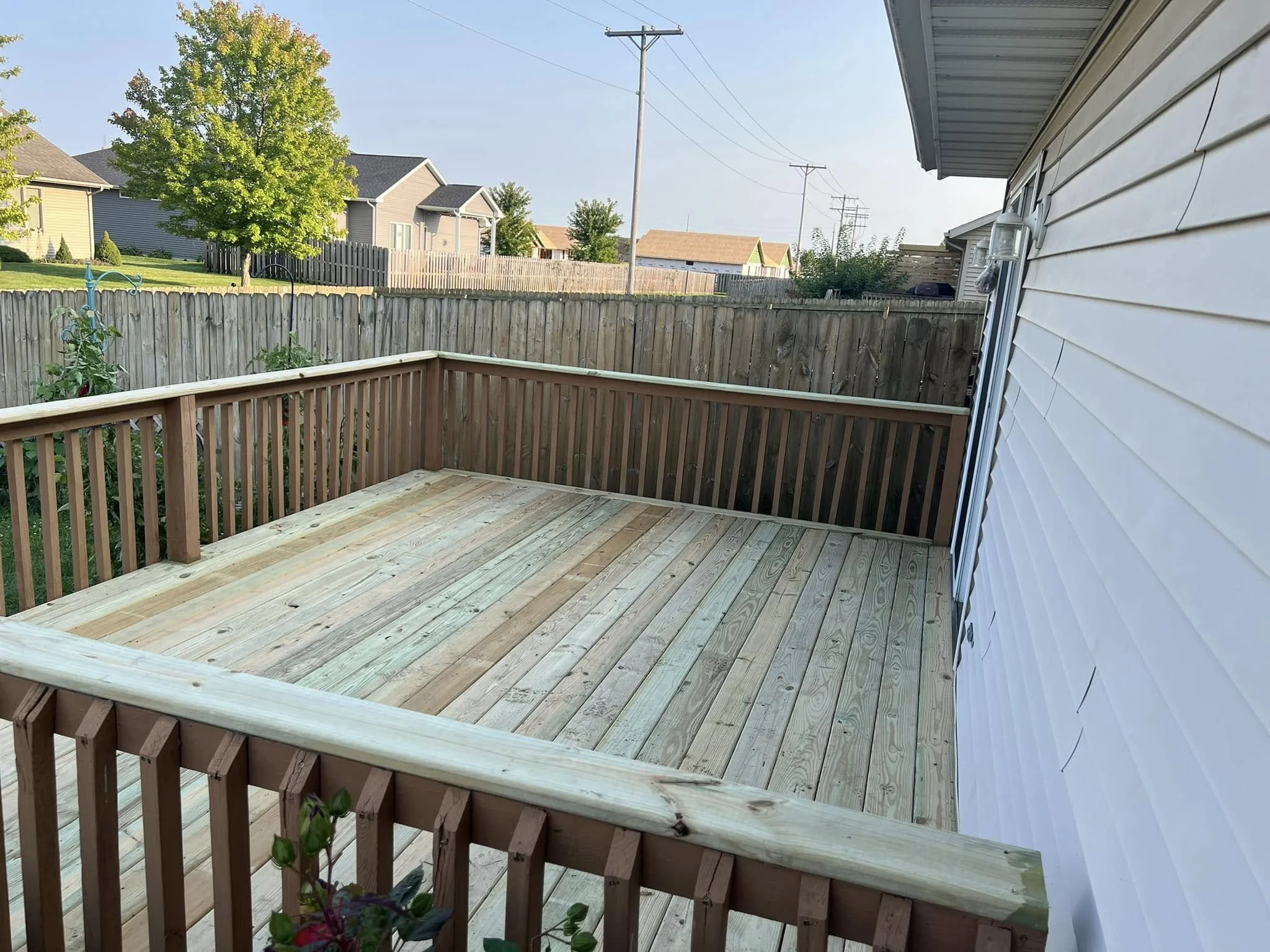Deck resurfaced — new boards over the existing frame