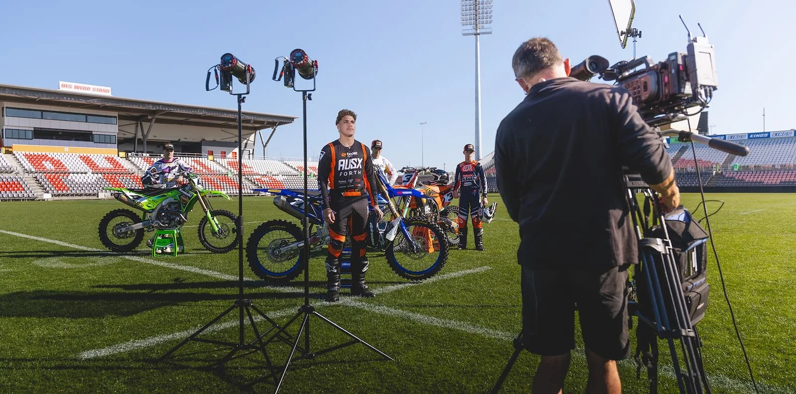 NRL star Reece Walsh and motocross athletes during a branded shoot, representing integrated talent partnerships and cross-sport media campaigns