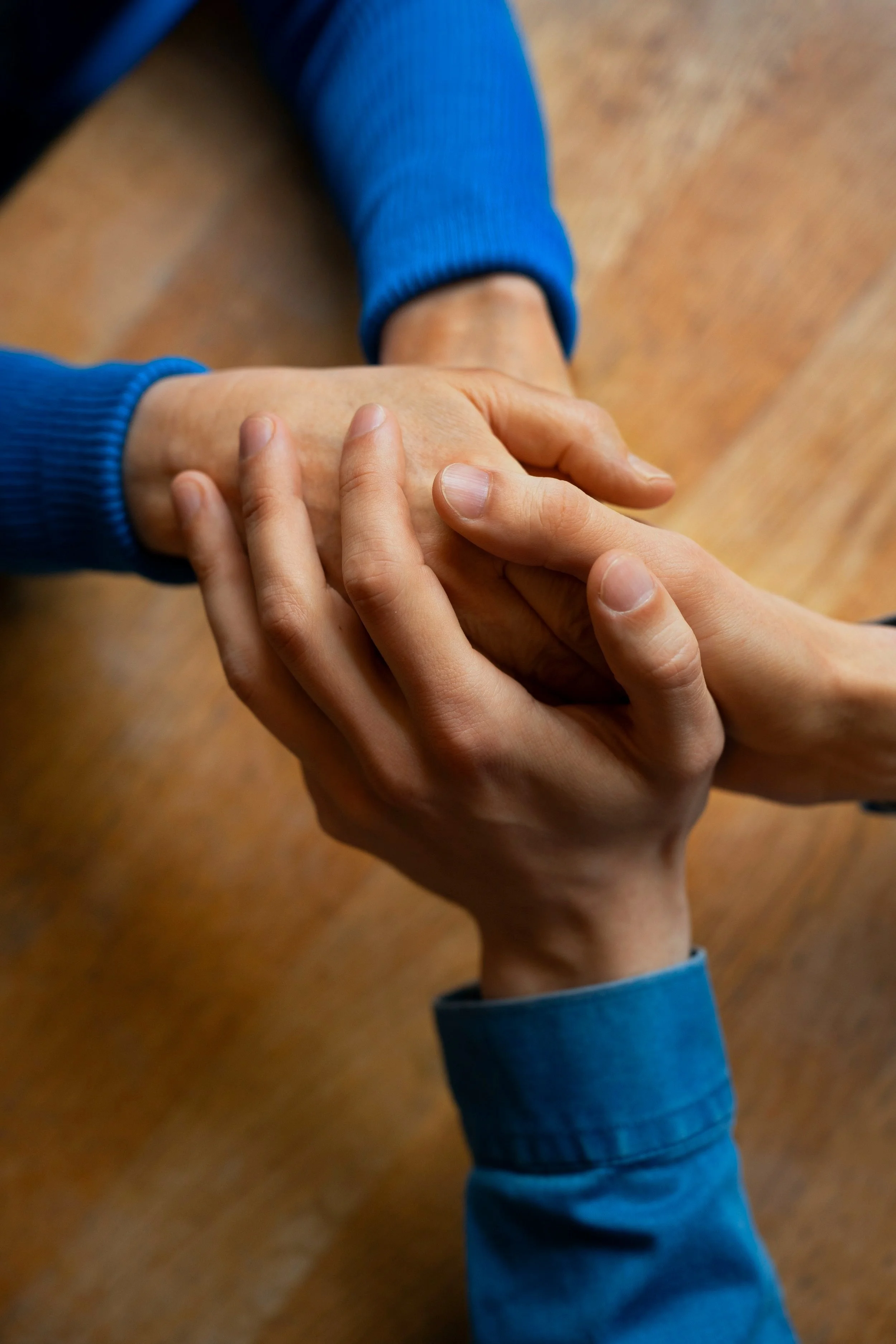 hands-holding-each-other-support.jpg