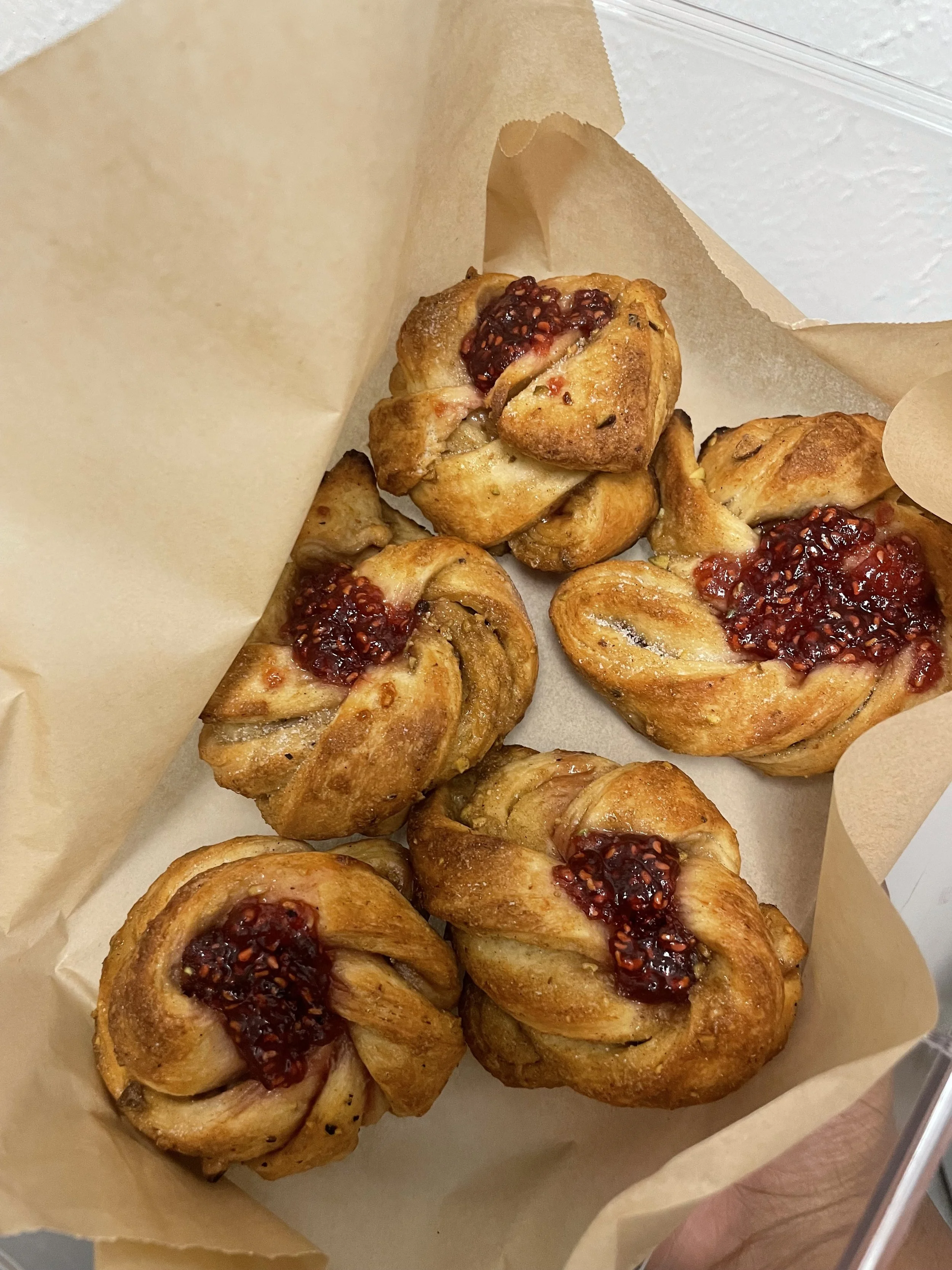 Pistachio Cardamom Twists with Fresh Raspberry Preserve Filling 
