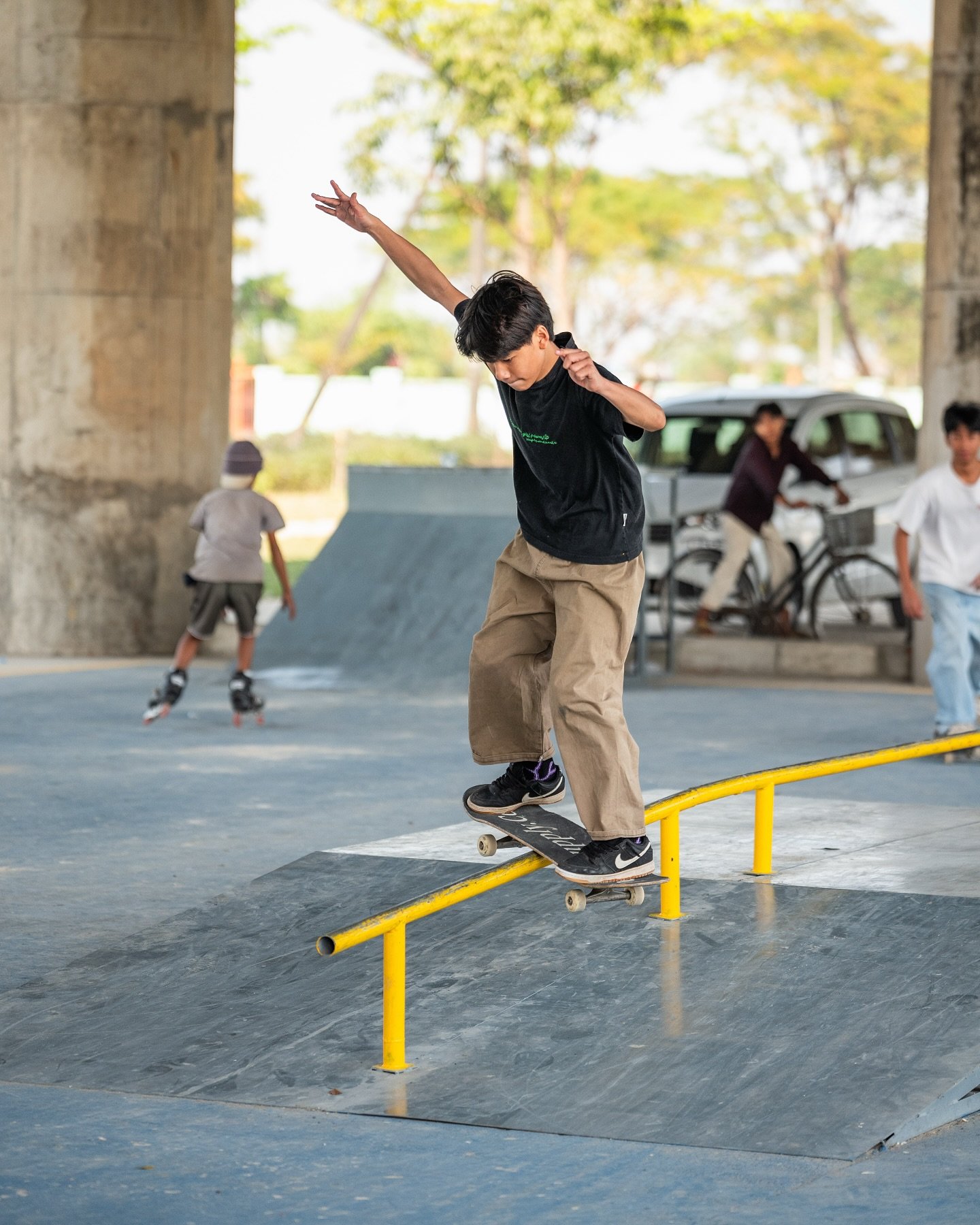 @chanmyae5244 with a backside boardslide at the new skatepark in Hlaing Thar Yar, Yangon.
