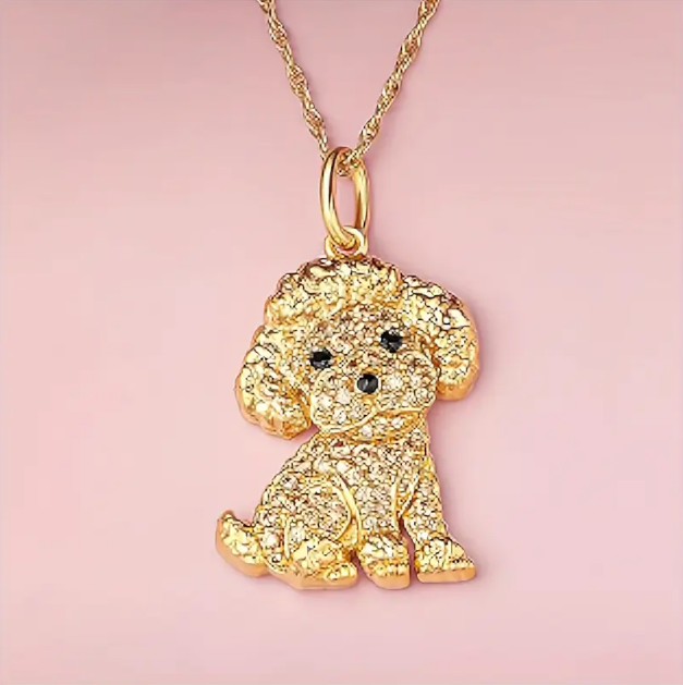 Show your love for pets with this Gold-Plated Gem-Studded Poodle Pendant Necklace – a stylish and sparkling accessory for dog enthusiasts.