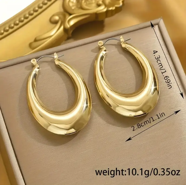 Upgrade your style with Mozzimo Jewelry’s Gold Plated Large Oval Hoop Earrings—bold gold statement hoops with a sleek oval design—available now at www.mozzimojewelry.com.