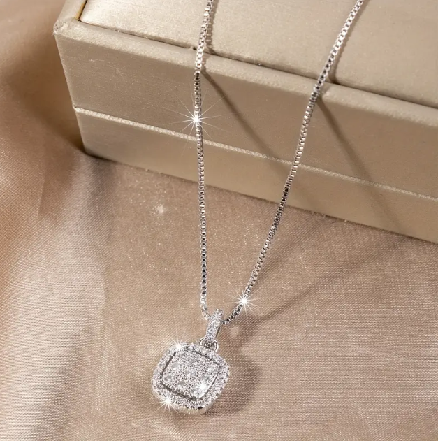 Shop the Sterling Silver Rhinestone Encrusted Oversize Circle Pendant Necklace at Mozzimo Jewelry—elegant, sparkling, and perfect for making a bold, fashion-forward statement!