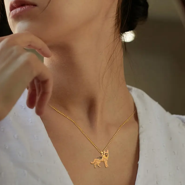 Shop Mozzimo Jewelry’s stunning gold-plated rhinestone German Shepard pendant necklace, celebrating your love for dogs with sparkling elegance.