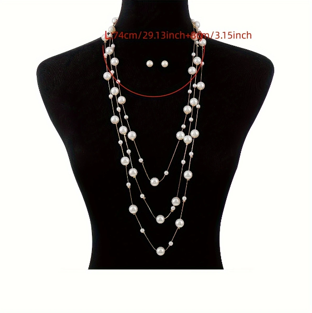 Drape yourself in elegance with Mozzimo Jewelry’s long triple-layer faux pearl necklace set — effortless glamor with modern layering appeal.
