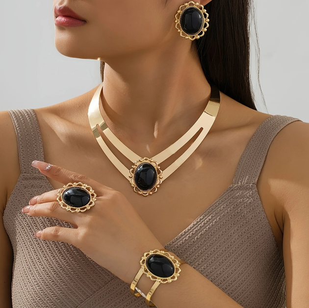 Make an unforgettable entrance with Mozzimo Jewelry’s 5 piece gold-plated black gemstone statement set, the ultimate in bold, elegant fashion.