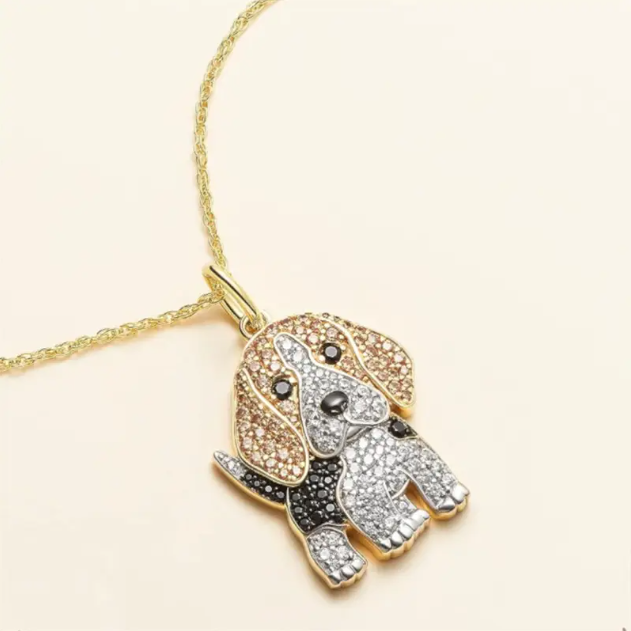 Discover Mozzimo Jewelry's Gold Plated Rhinestone Encrusted Beagle Pendant Necklace – a sparkling tribute to dog lovers, blending elegance and charm. Shop now for unique jewelry designs!