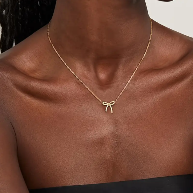 Discover the Gold Plated Dainty Bowtie Fine Necklace, a delicate and stylish accessory perfect for any occasion.
