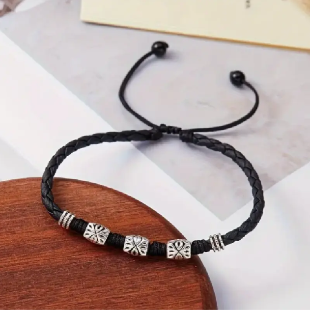 Add a touch of sophistication with the Men's Sterling Silver and Black Cord Rope Ankle Bracelet Anklet from Mozzimo Jewelry. Shop now at www.mozzimojewelry.com.