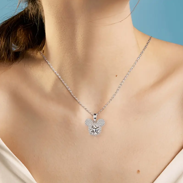 Add a touch of magic with our Sterling Silver Gemstone Mickey Mouse Charm Necklace—sparkling, iconic, and perfect for Disney lovers. Shop now at Mozzimo Jewelry!