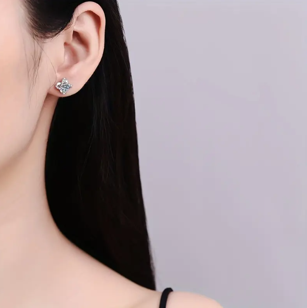 Elegant four-leaf clover gemstone-studded silver earrings, a timeless symbol of luck and style, available now at Mozzimo Jewelry.