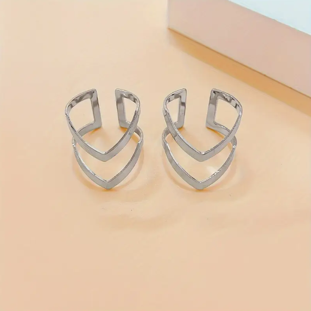 Upgrade your jewelry collection with our 2 Piece Sterling Silver Double Chevron Adjustable One Size Ring, a trendy, minimalist, and stackable accessory.