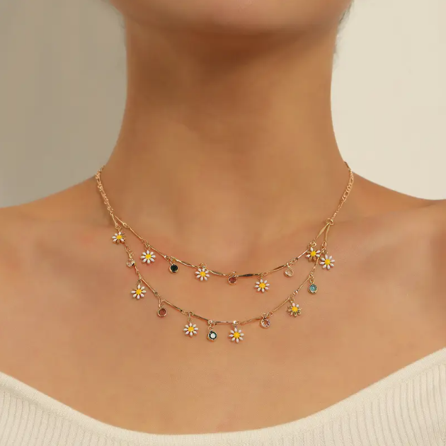 Delicate gold-plated daisy charm necklace with layered gemstone accents β perfect for spring, cottagecore.