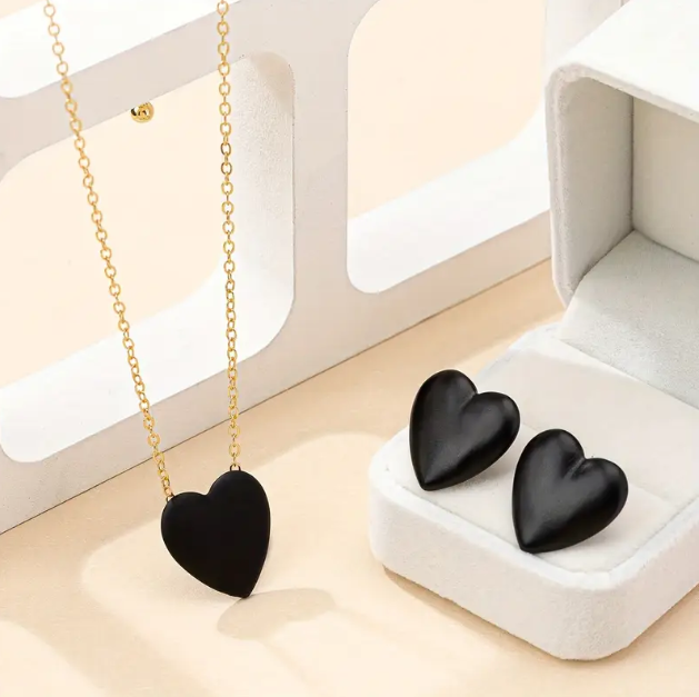 Elevate your style with our Gold Plated Black Heart Pendant Necklace and Stud Earrings Set, a minimal yet bold jewelry piece that blends romance and sophistication.