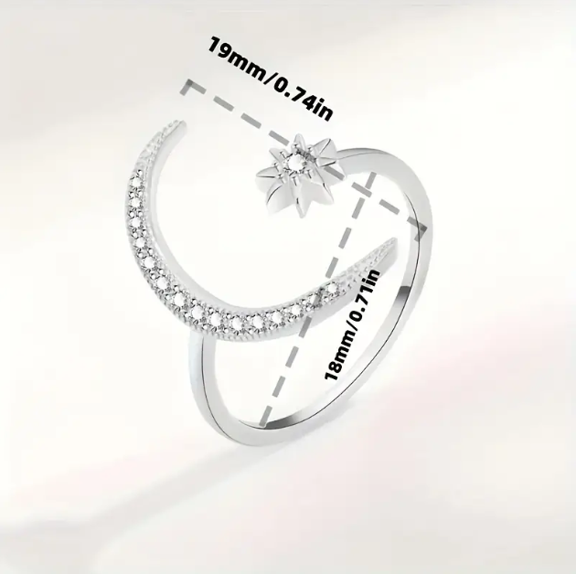 Embrace the magic of the cosmos with the Sterling Silver Moon and Star Rhinestone Ring from Mozzimo Jewelry – a celestial statement piece.