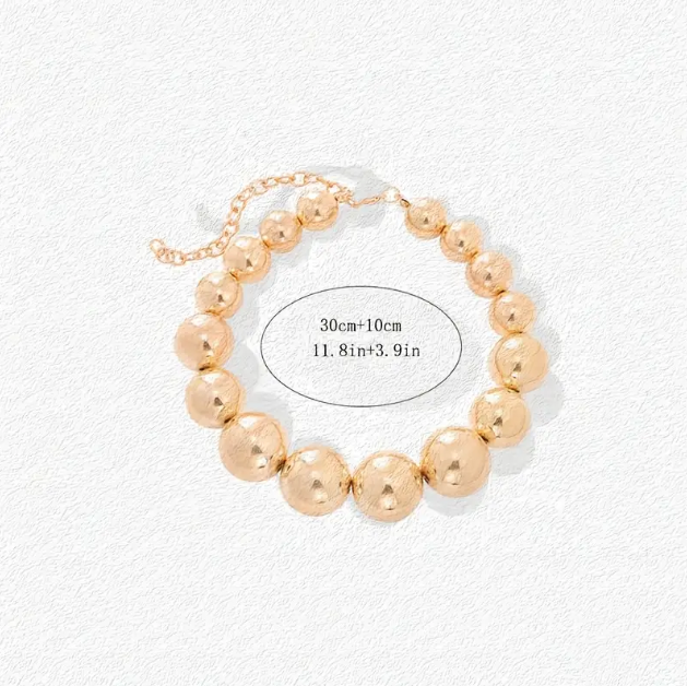 Make a bold fashion statement with this Gold Plated Large Pearl Beads Statement Choker Necklace, a glamorous and trendy must-have for every jewelry lover.