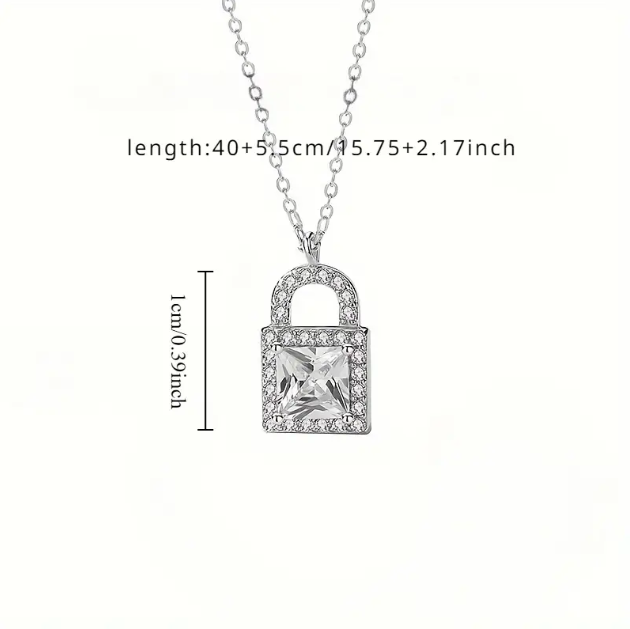 Unlock timeless elegance with the Sterling Silver Rhinestone Encrusted Small Lock Pendant Necklace, a sparkling and stylish accessory—available now at Mozzimo Jewelry.
