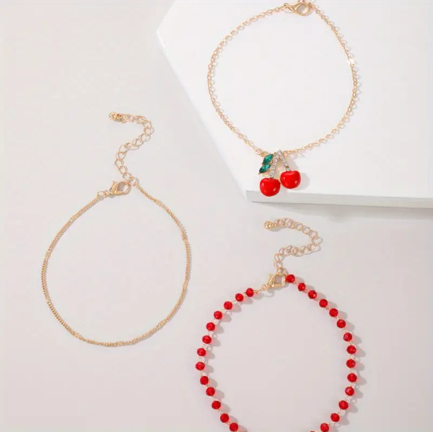 Add a pop of playful color with our 3 piece cherry charm and red beaded anklet set – perfect for summer, layering, and standout style.