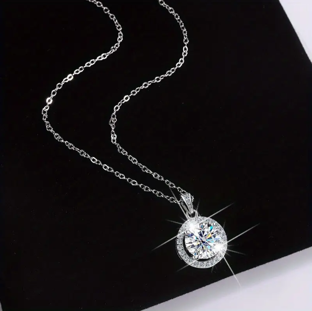 Shine with the Sterling Silver Cubic Zirconia Circle Pendant Necklace, a timeless and elegant piece perfect for any occasion—available now at Mozzimo Jewelry.